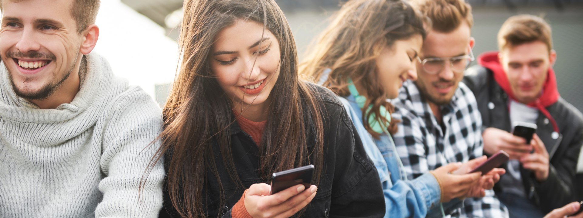 Young people with phones