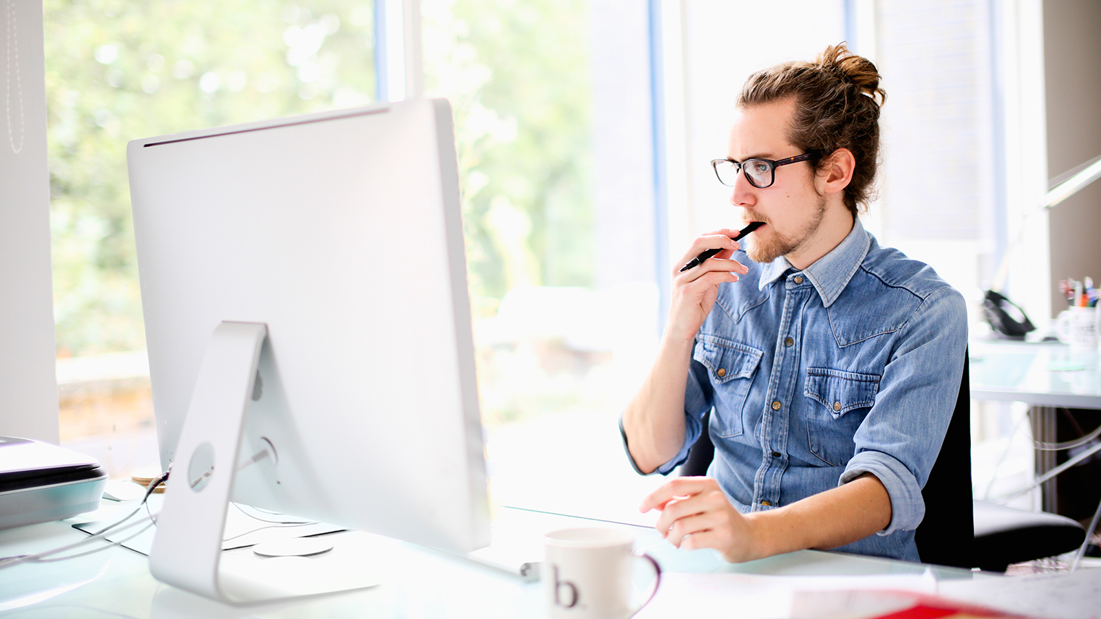 Man working in fron of his computer