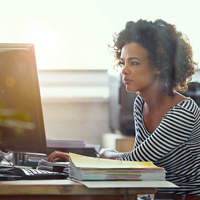 Woman looking at computer.