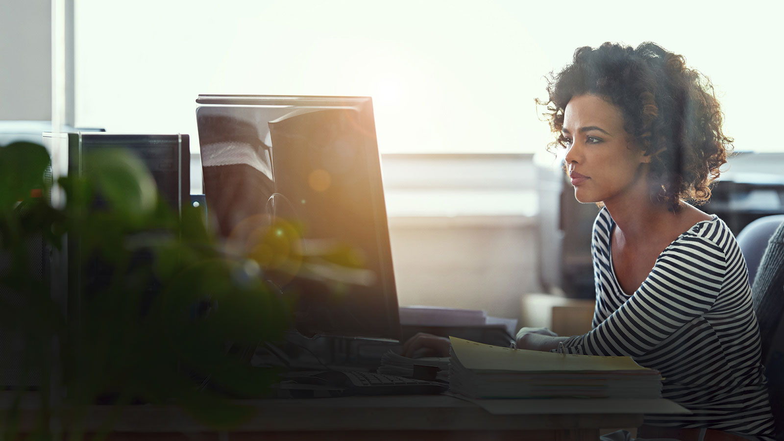 woman sitting in front of a computer