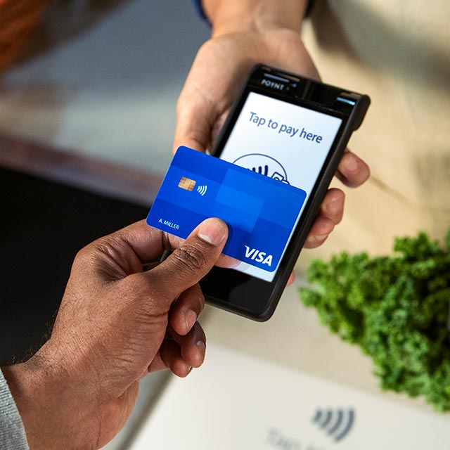 Man making contactless card payment