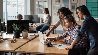 The team works together on the project