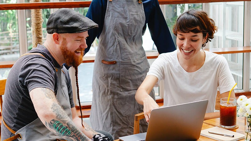 couple looking at laptop