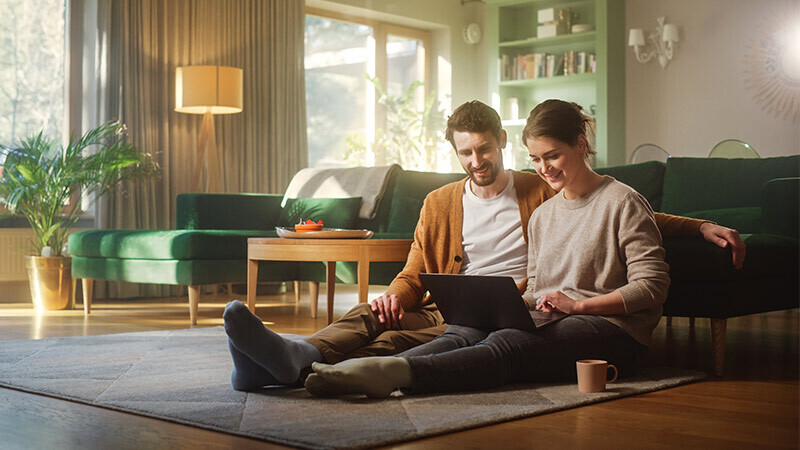 couple using laptop